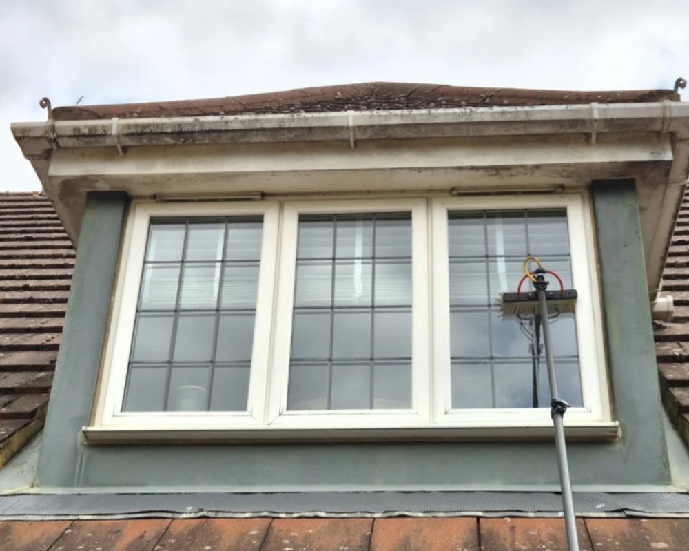 Dormer fascias and soffits in Northampton before cleaning